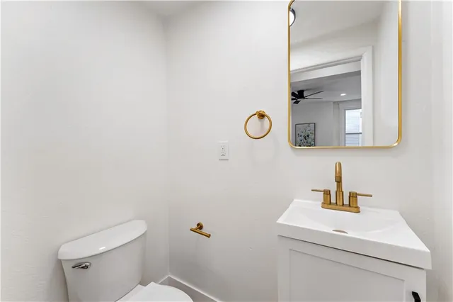 a spacious bedroom with a bed and a couch