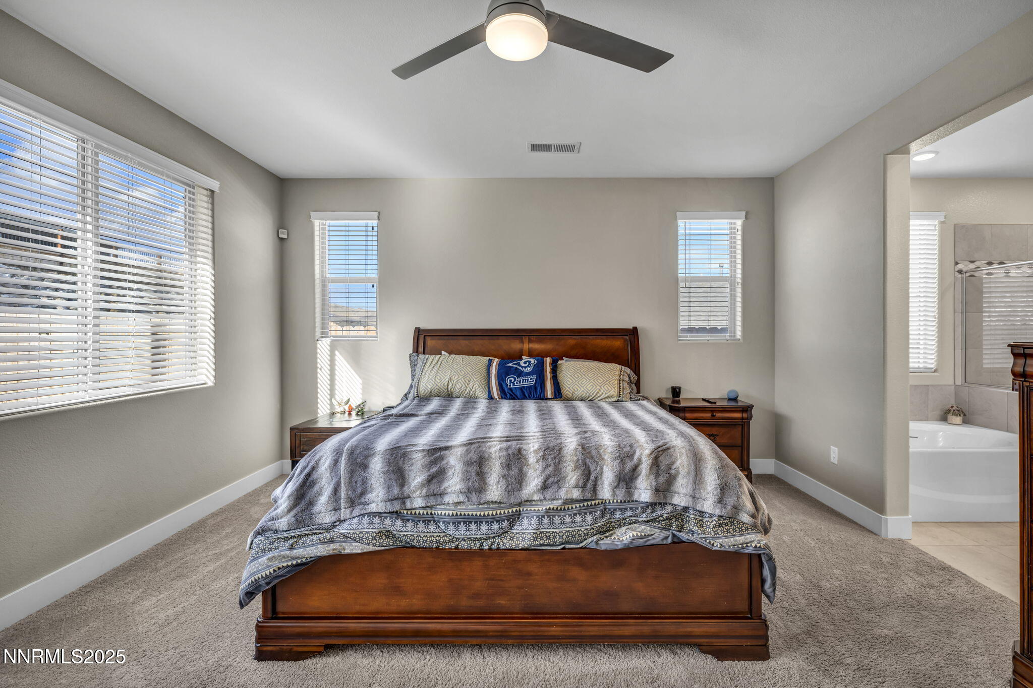 32 Stellar Court Carson City, NV 89705 - Photo 16 of 49 a bedroom with a bed and window