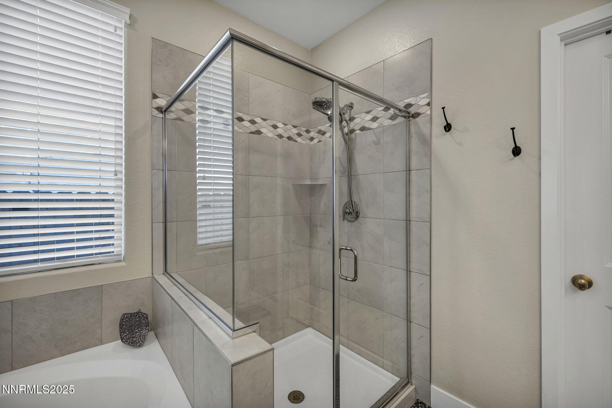 32 Stellar Court Carson City, NV 89705 - Photo 22 of 49 a bathroom with a shower and a sink
