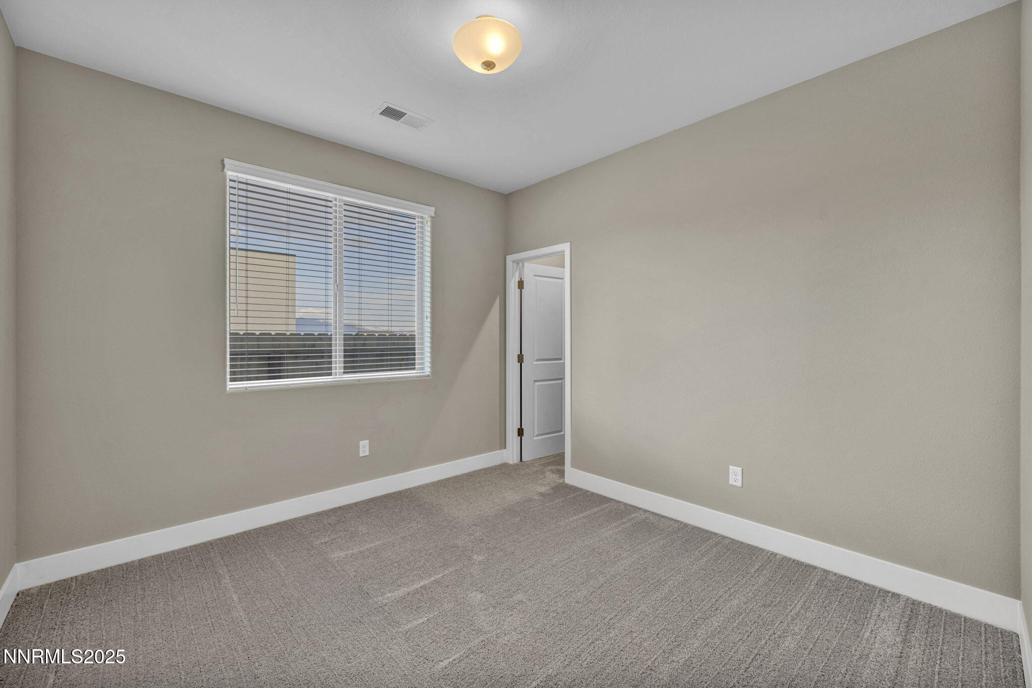 32 Stellar Court Carson City, NV 89705 - Photo 28 of 49 an empty room with windows