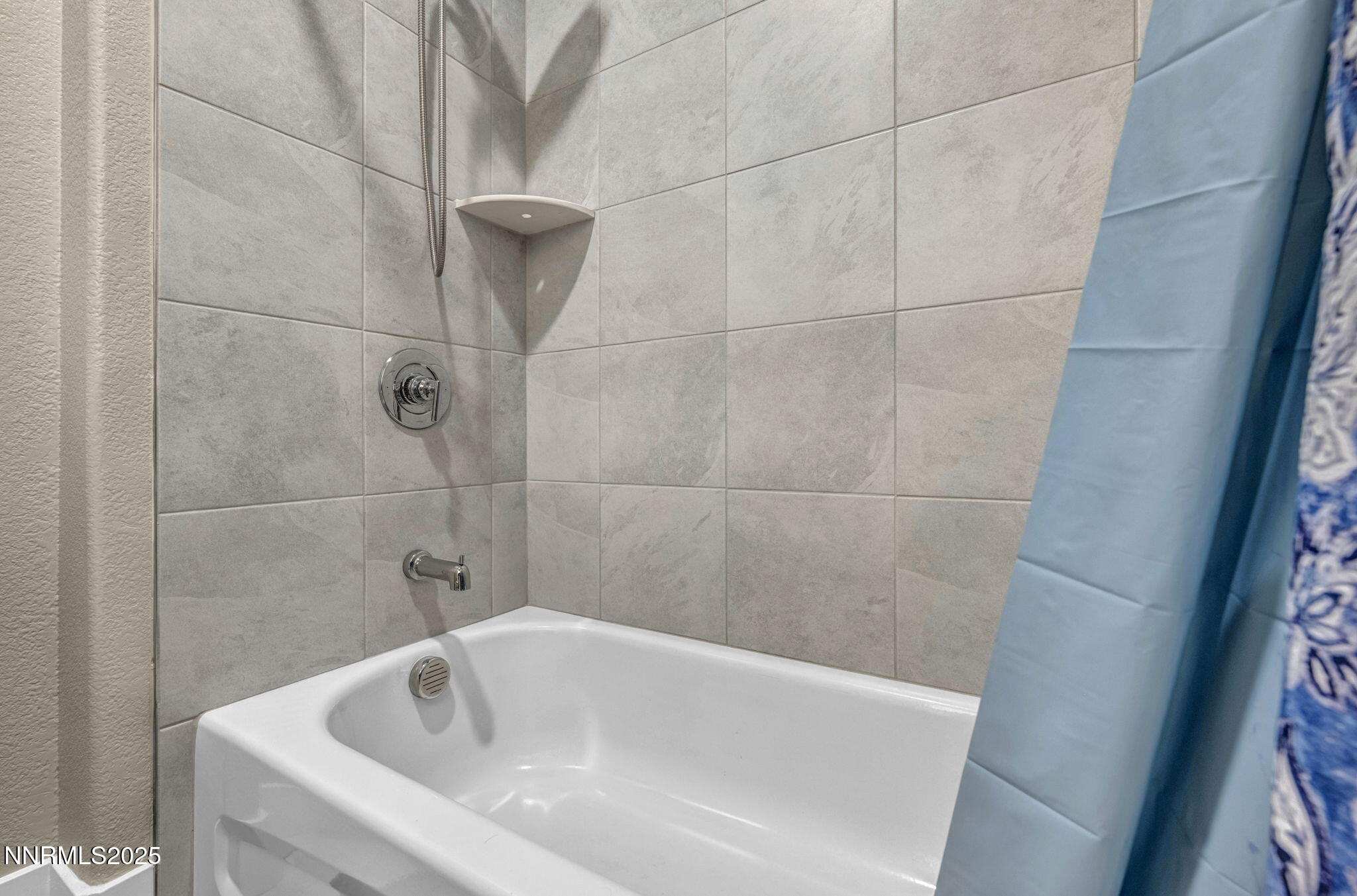 32 Stellar Court Carson City, NV 89705 - Photo 31 of 49 a white bath tub sitting in a bathroom