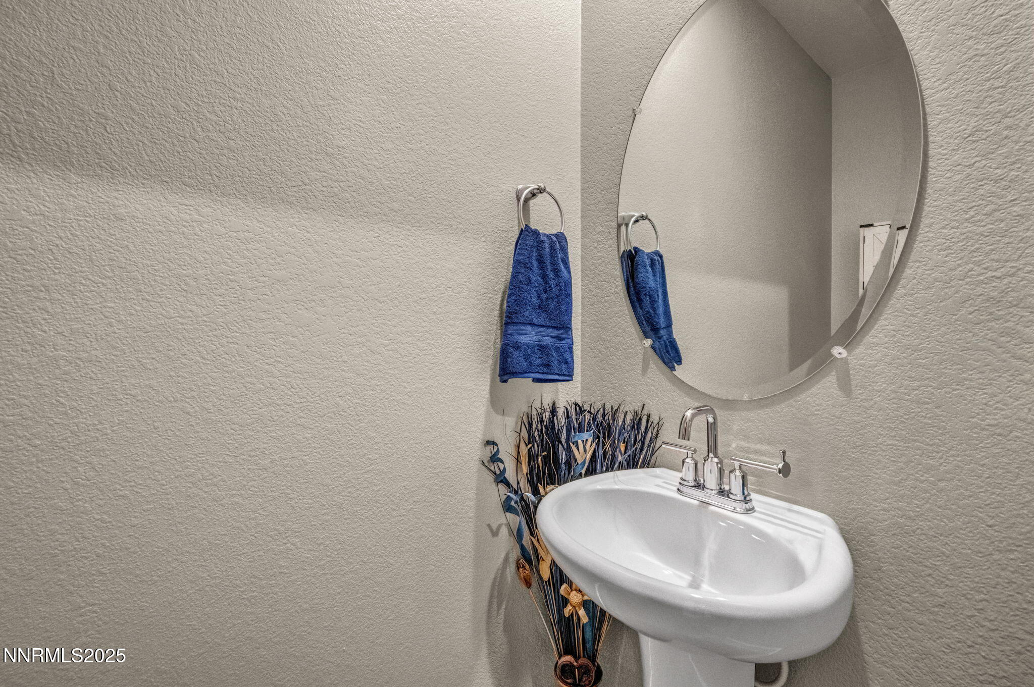 32 Stellar Court Carson City, NV 89705 - Photo 32 of 49 a bathroom with a sink and a mirror