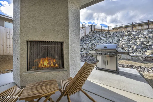 a living room with a couch and a fireplace