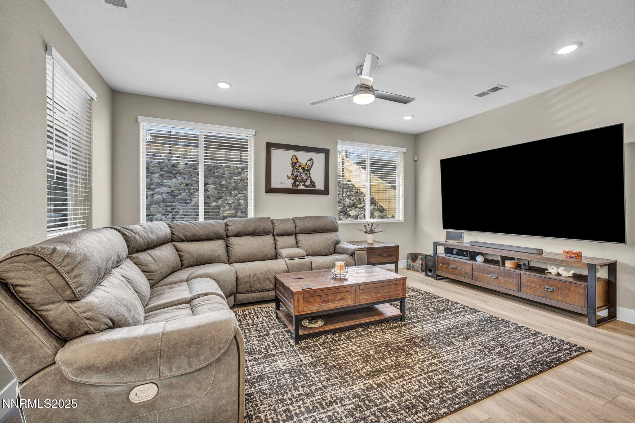 32 Stellar Court Carson City, NV 89705 - Photo 8 of 49 a living room with furniture and a flat screen tv