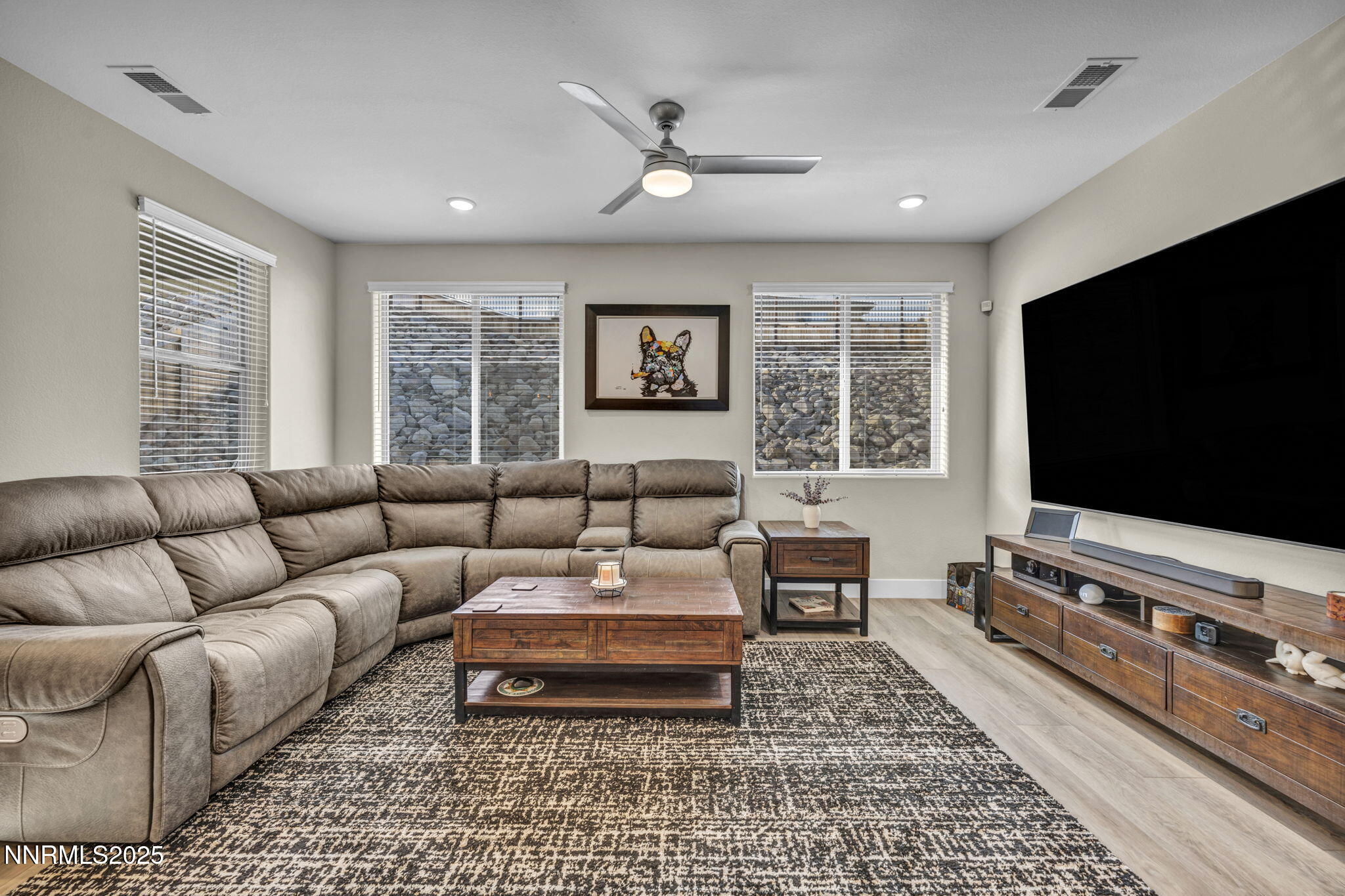 32 Stellar Court Carson City, NV 89705 - Photo 9 of 49 a living room with furniture and a flat screen tv