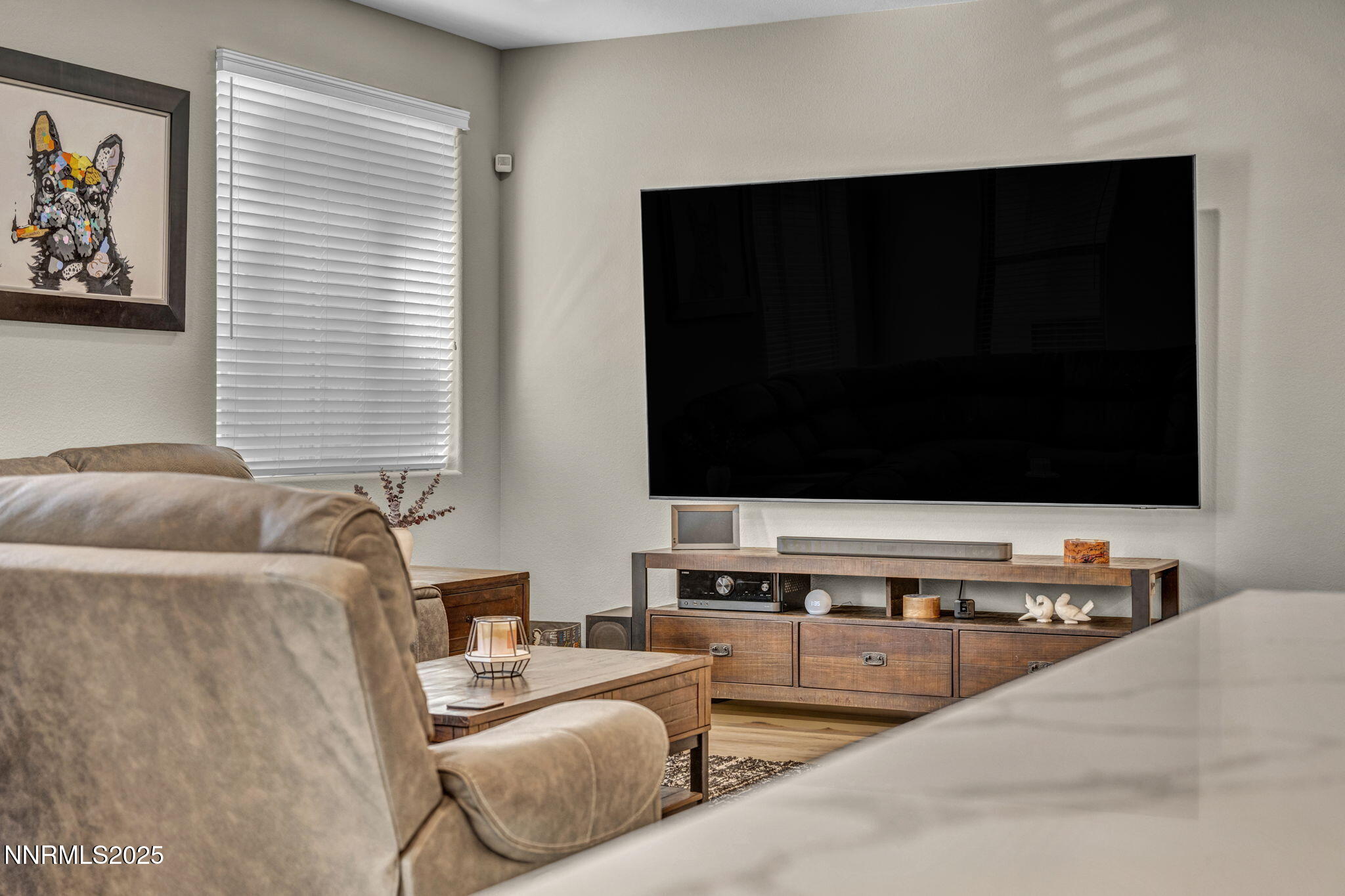 32 Stellar Court Carson City, NV 89705 - Photo 10 of 49 a living room with furniture and a flat screen tv
