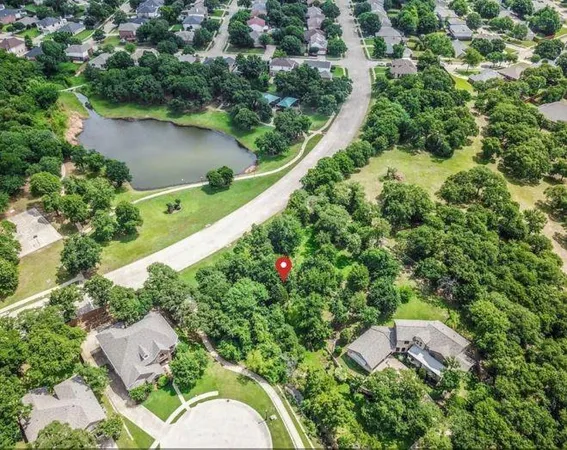 an aerial view of house with yard swimming pool and outdoor seating