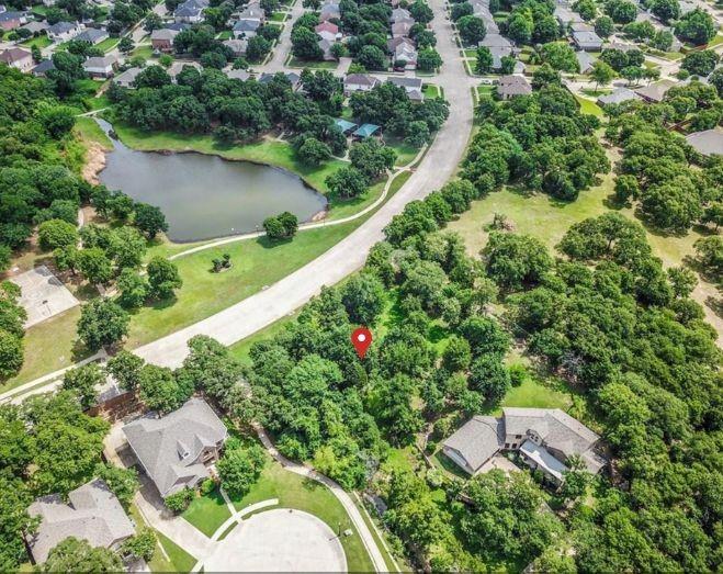 an aerial view of house with yard swimming pool and outdoor seating