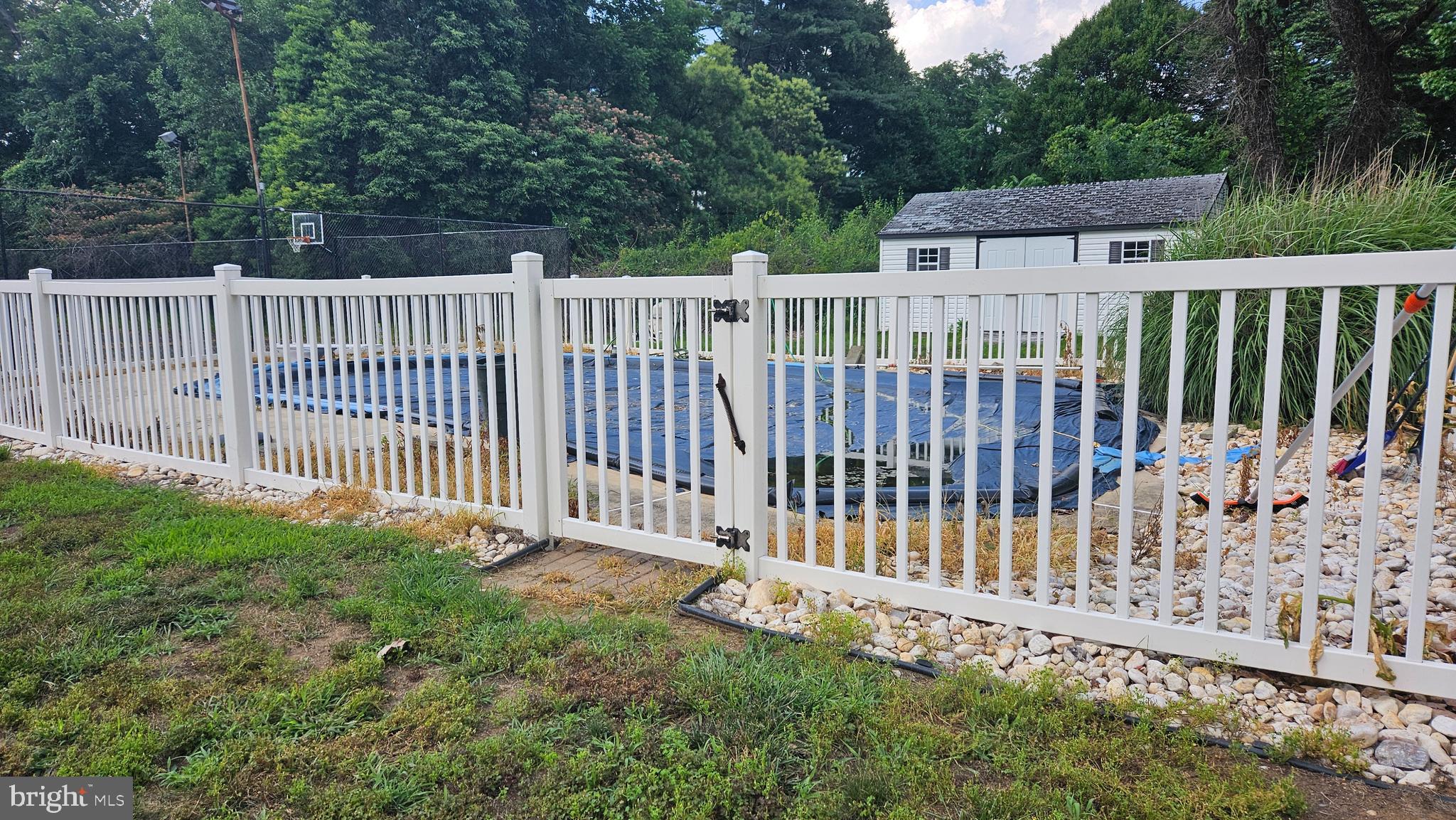 204 Dale Road Mount Holly, NJ 08060 - Photo 6 of 8 a view of a fence with a small yard