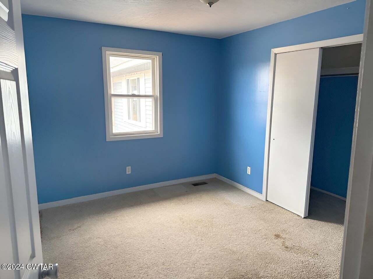 1759 Janes Mill Road Gleason, TN 38229 - Photo 12 of 18 an empty room with a window