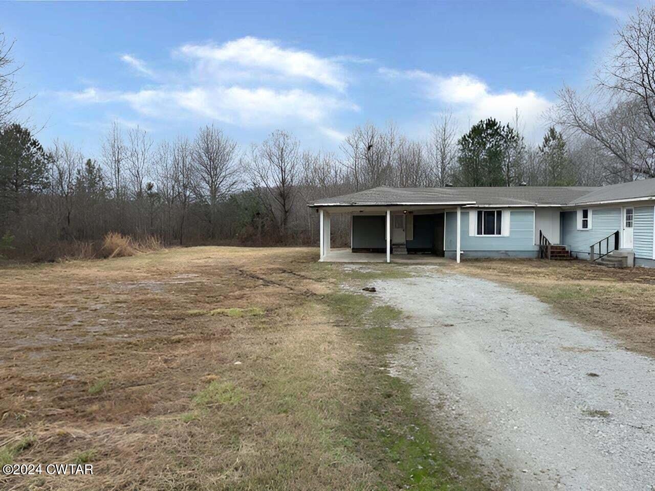 1759 Janes Mill Road Gleason, TN 38229 - Photo 2 of 18 a view of house with yard and entertaining space