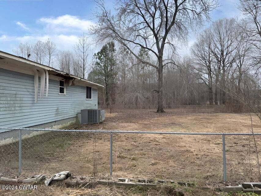 1759 Janes Mill Road Gleason, TN 38229 - Photo 5 of 18 a view of a backyard of the house