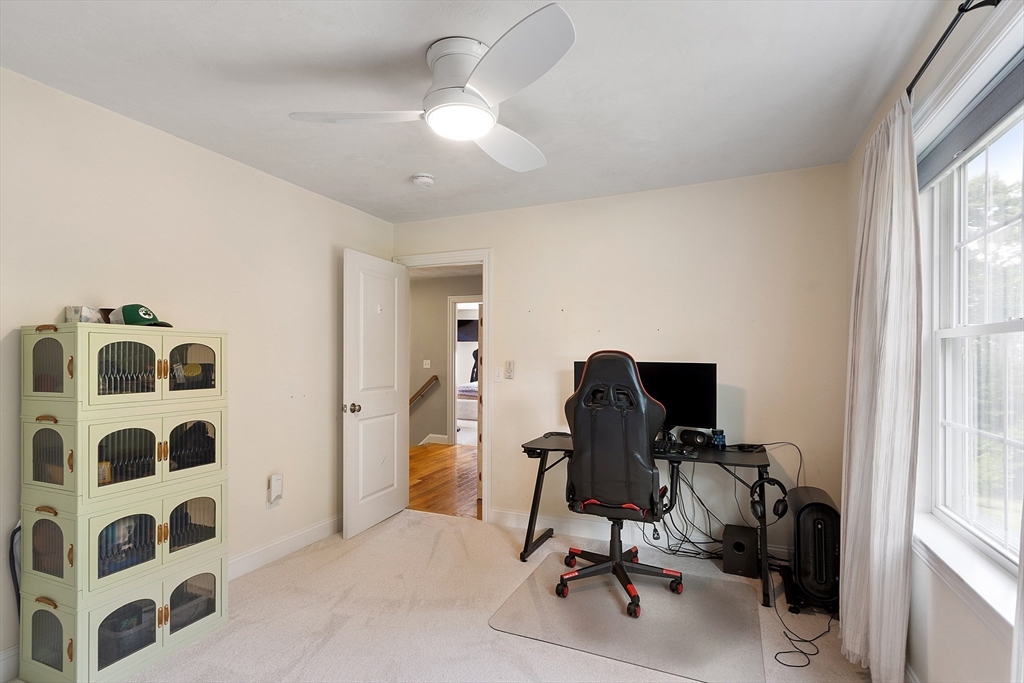 46 Jordan Road Holden, MA 01520 - Photo 29 of 42 a view of a workspace with furniture and a window