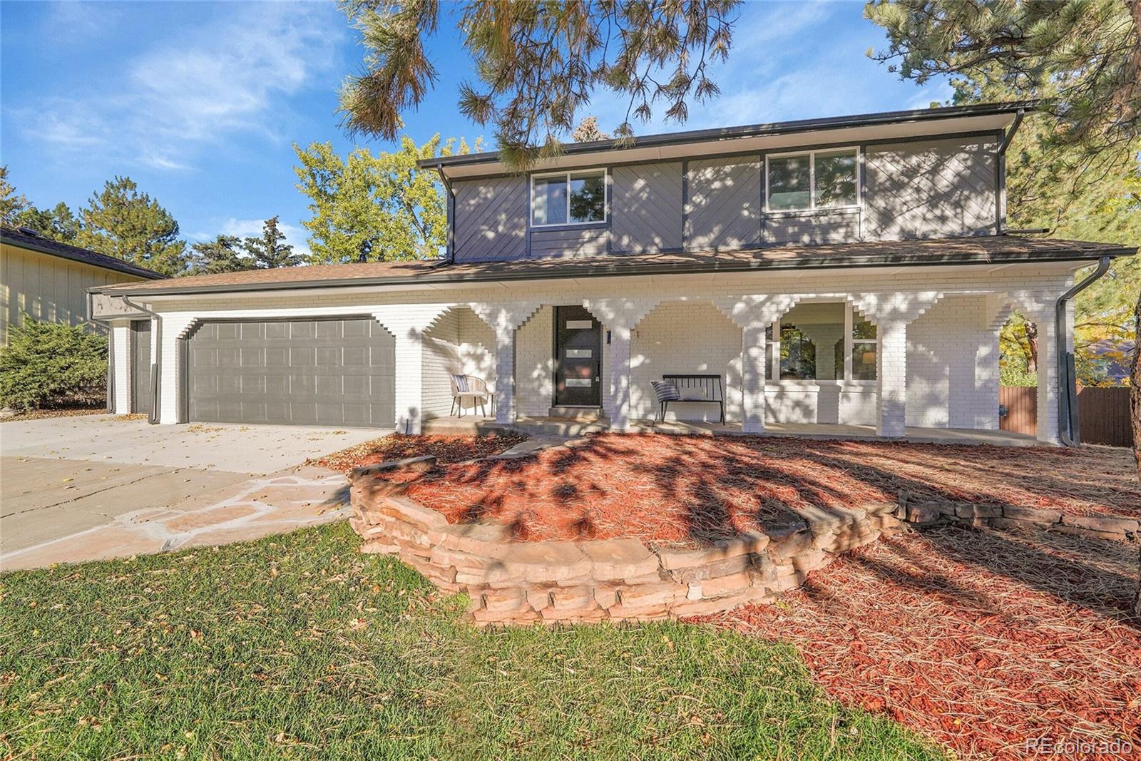 3261 South Oneida Way Denver, CO 80224 - Photo 2 of 43 front view of house