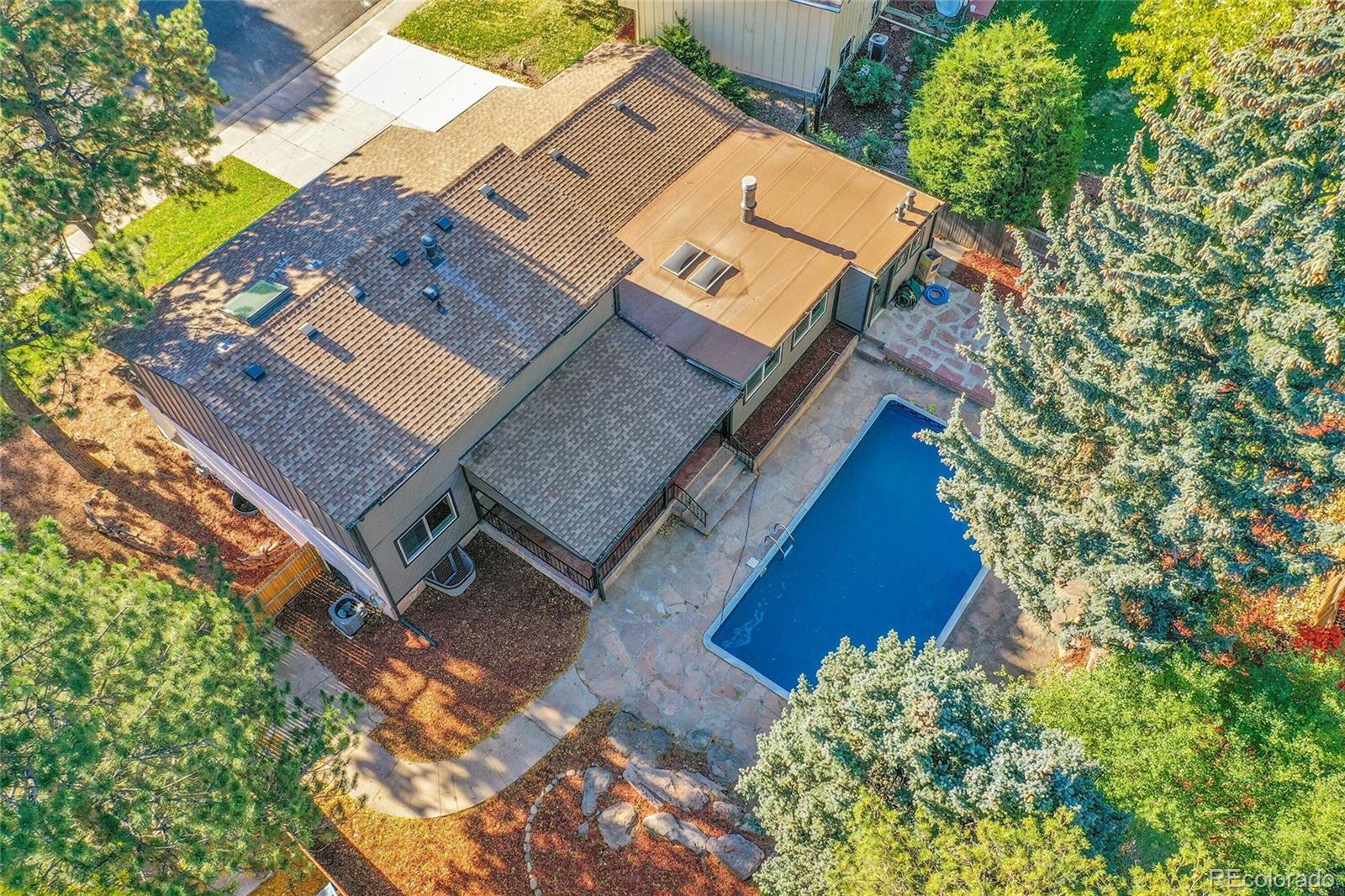 3261 South Oneida Way Denver, CO 80224 - Photo 41 of 43 an aerial view of a house with a yard