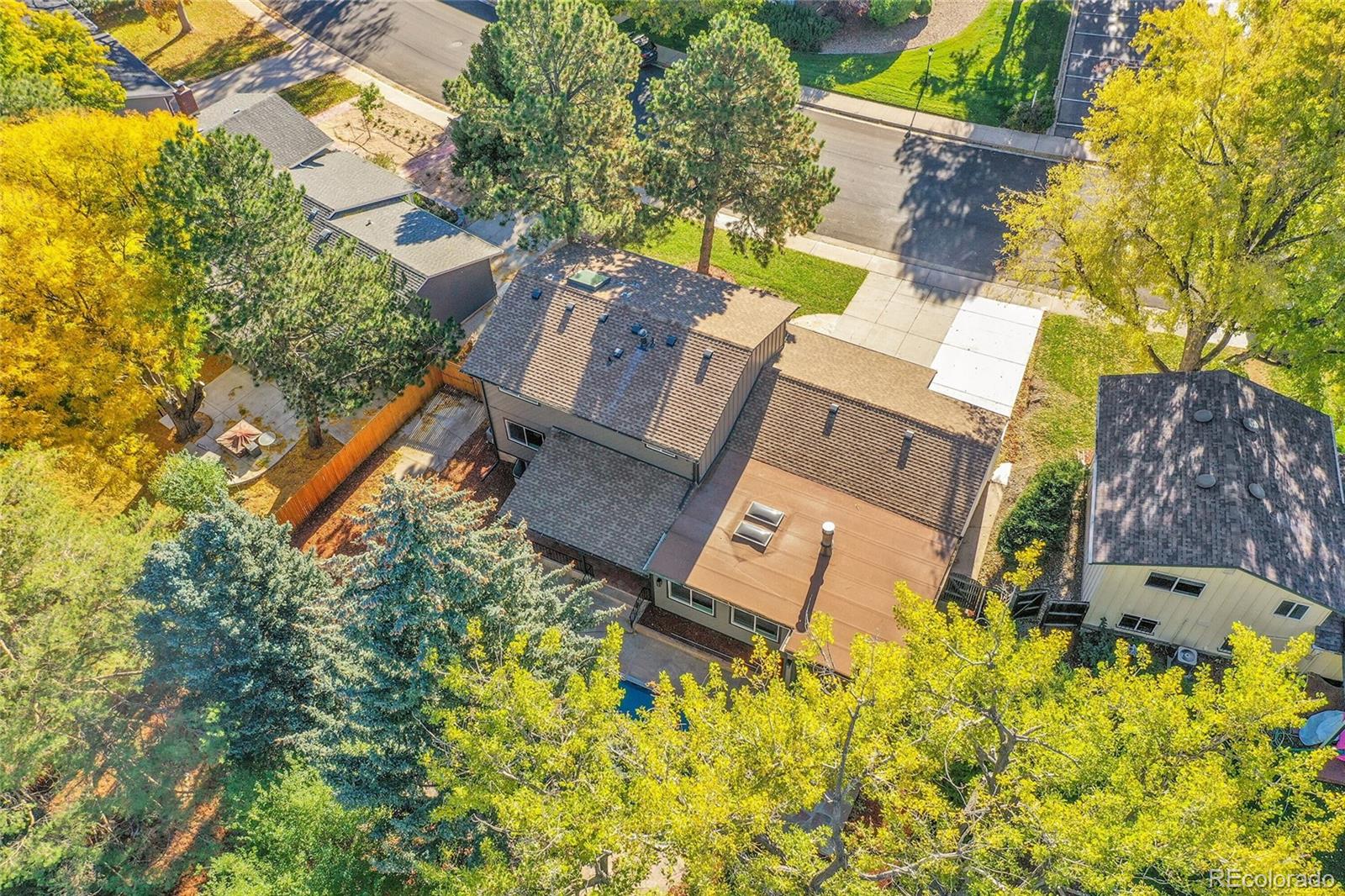 3261 South Oneida Way Denver, CO 80224 - Photo 42 of 43 front view of a house with a yard