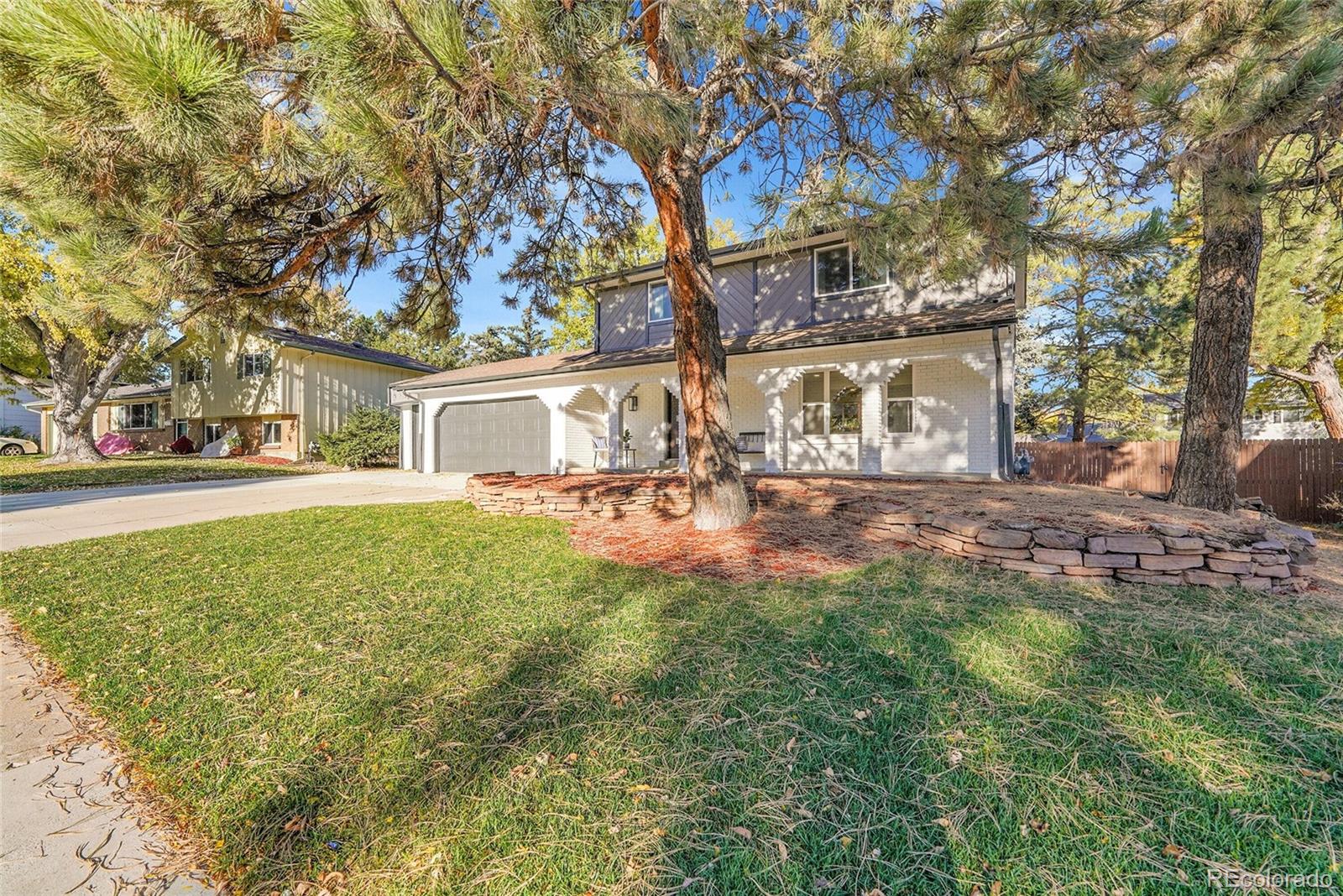3261 South Oneida Way Denver, CO 80224 - Photo 43 of 43 a house view with swimming pool in front of it