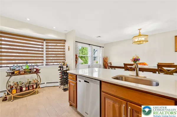 a kitchen with a sink and a window