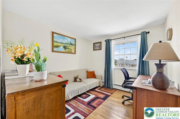 a living room with furniture and a table