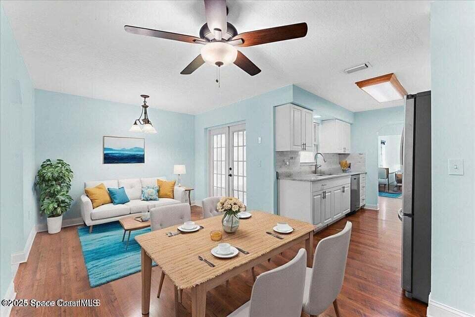 1527 Spruce Road Melbourne, FL 32935 - Photo 10 of 24 family room staged