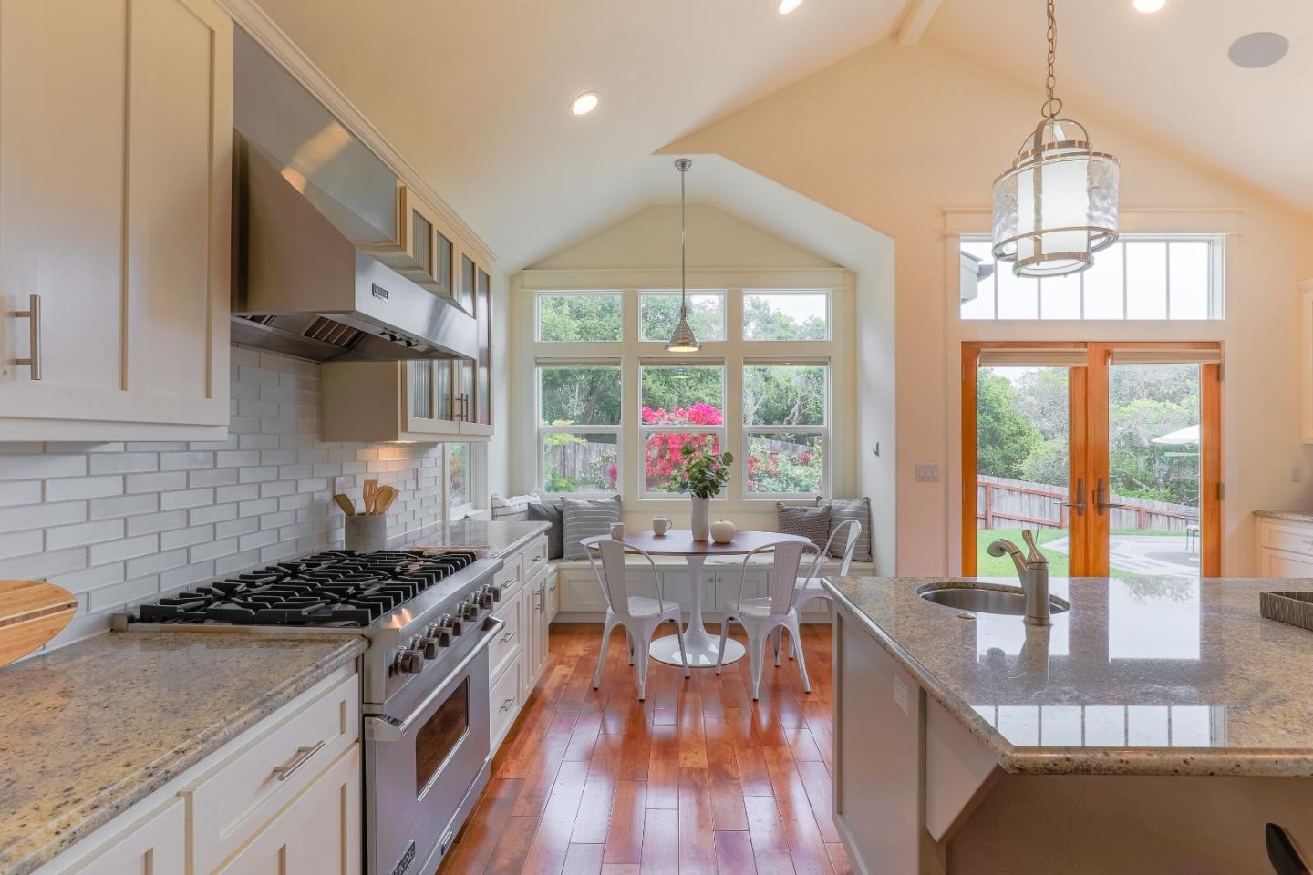 3030 Haas Drive Aptos, CA 95003 - Photo 11 of 44 a kitchen with stainless steel appliances a stove a sink and cabinets
