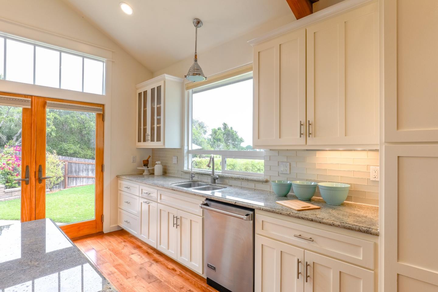 3030 Haas Drive Aptos, CA 95003 - Photo 16 of 44 a kitchen with granite countertop a sink a counter top space and cabinets