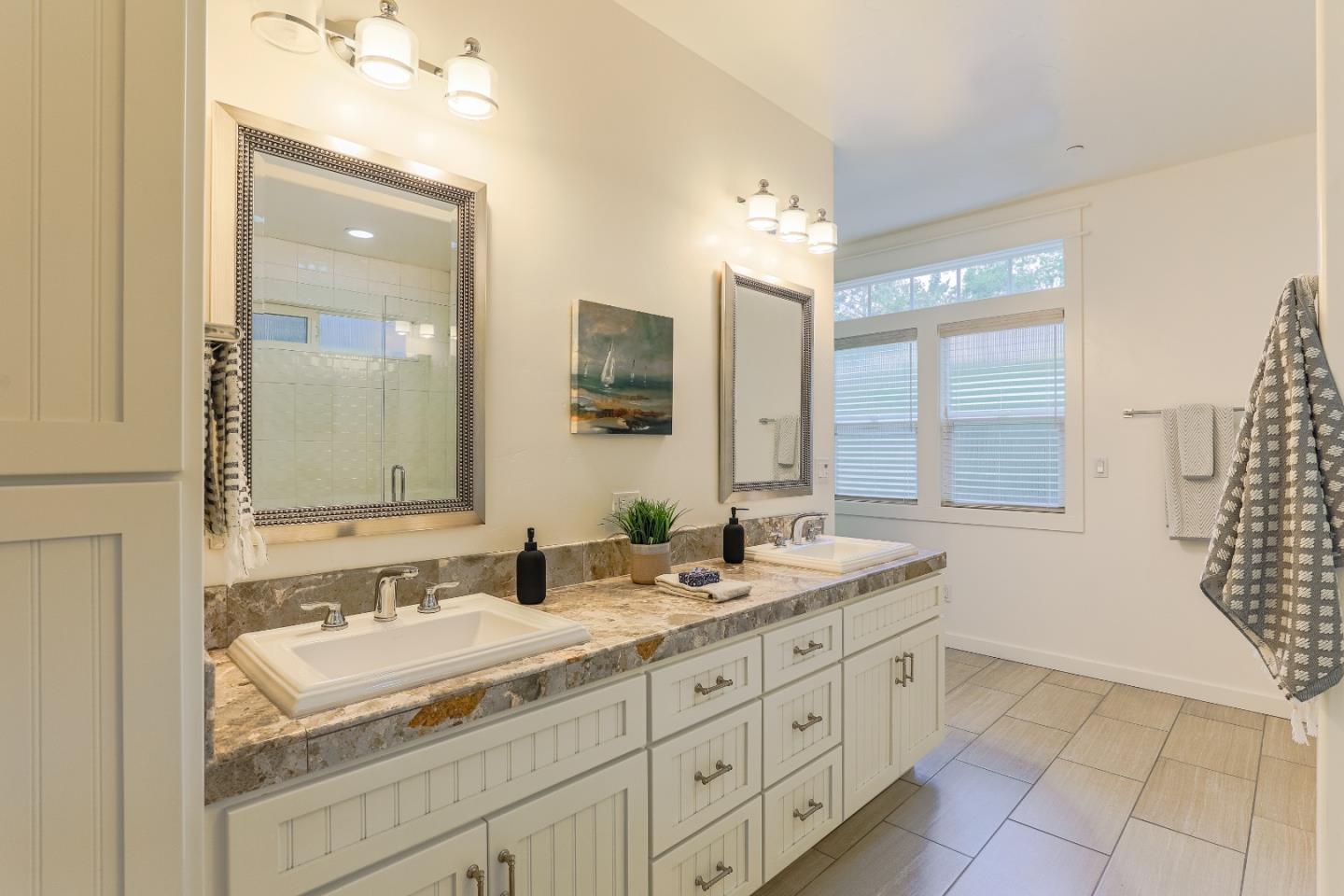 3030 Haas Drive Aptos, CA 95003 - Photo 28 of 44 a bathroom with a sink double vanity granite and a mirror