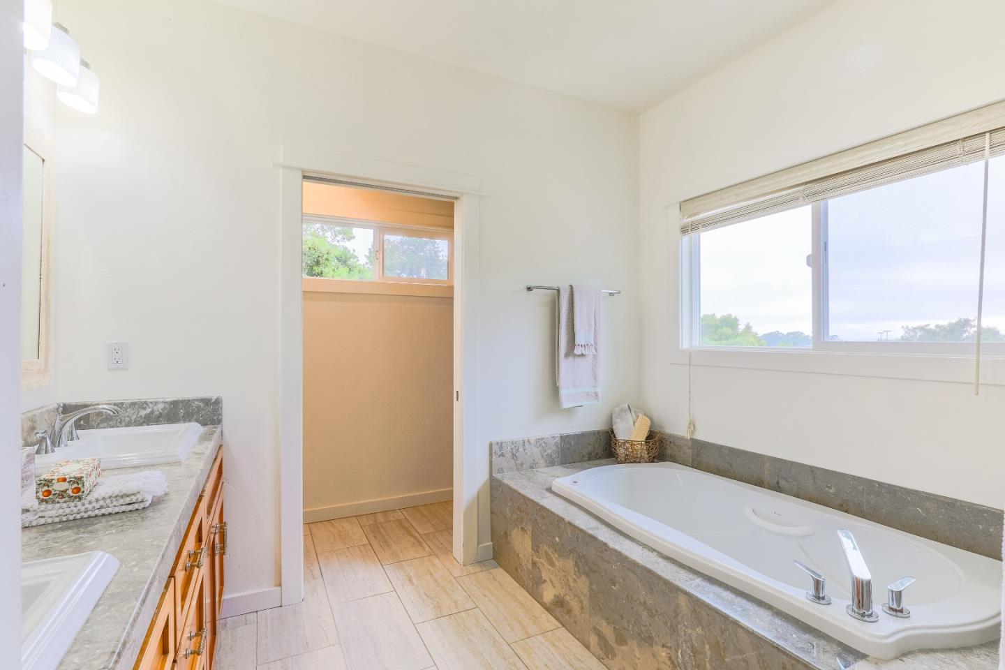 3030 Haas Drive Aptos, CA 95003 - Photo 31 of 44 a bathroom with a tub a sink and a window
