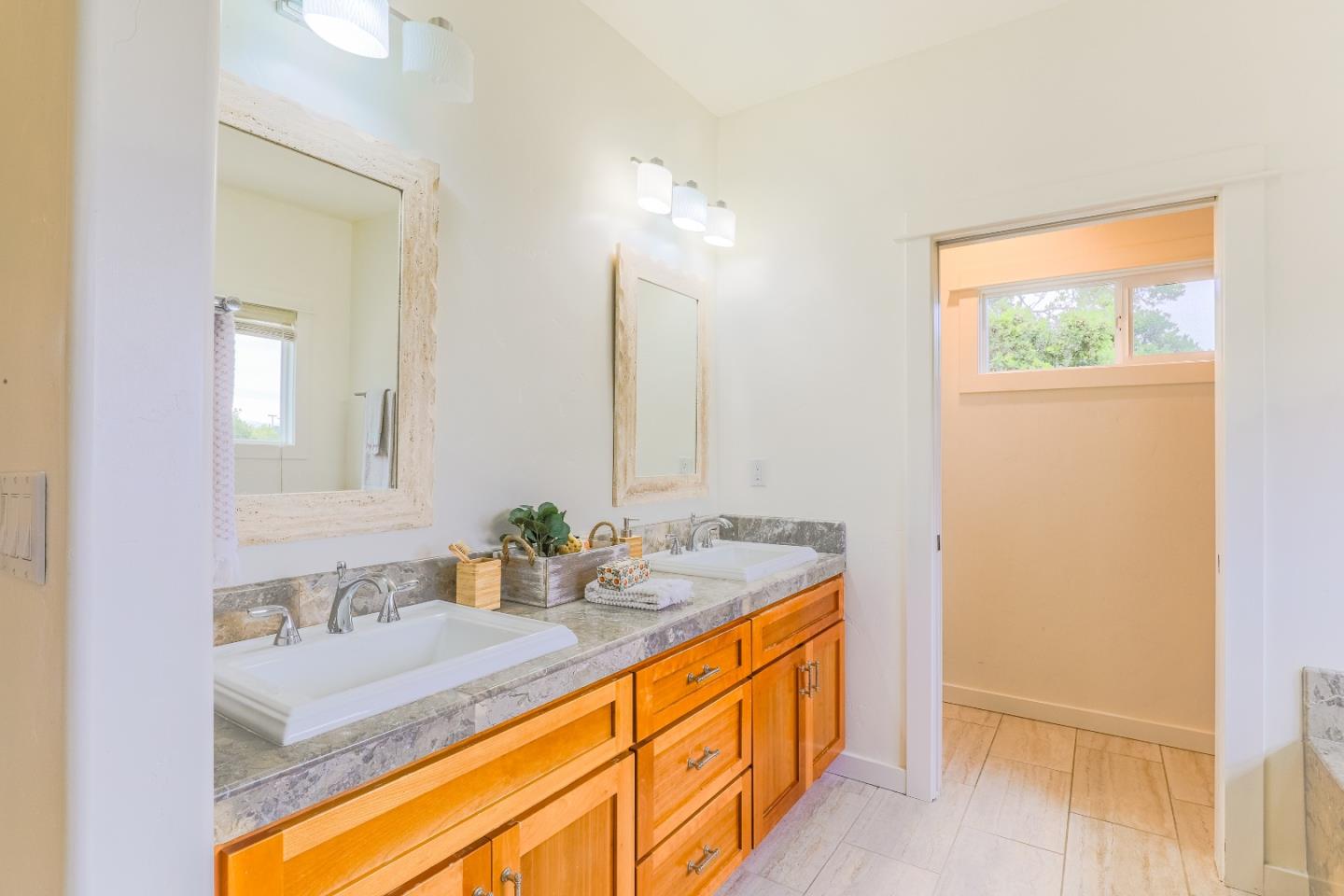 3030 Haas Drive Aptos, CA 95003 - Photo 32 of 44 a bathroom with a sink and a mirror