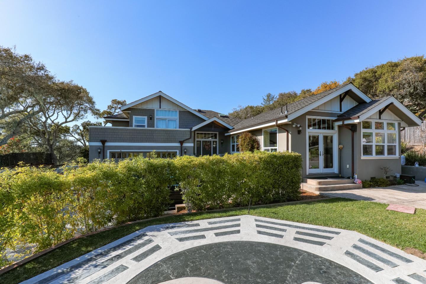 3030 Haas Drive Aptos, CA 95003 - Photo 5 of 44 a front view of a house with a yard