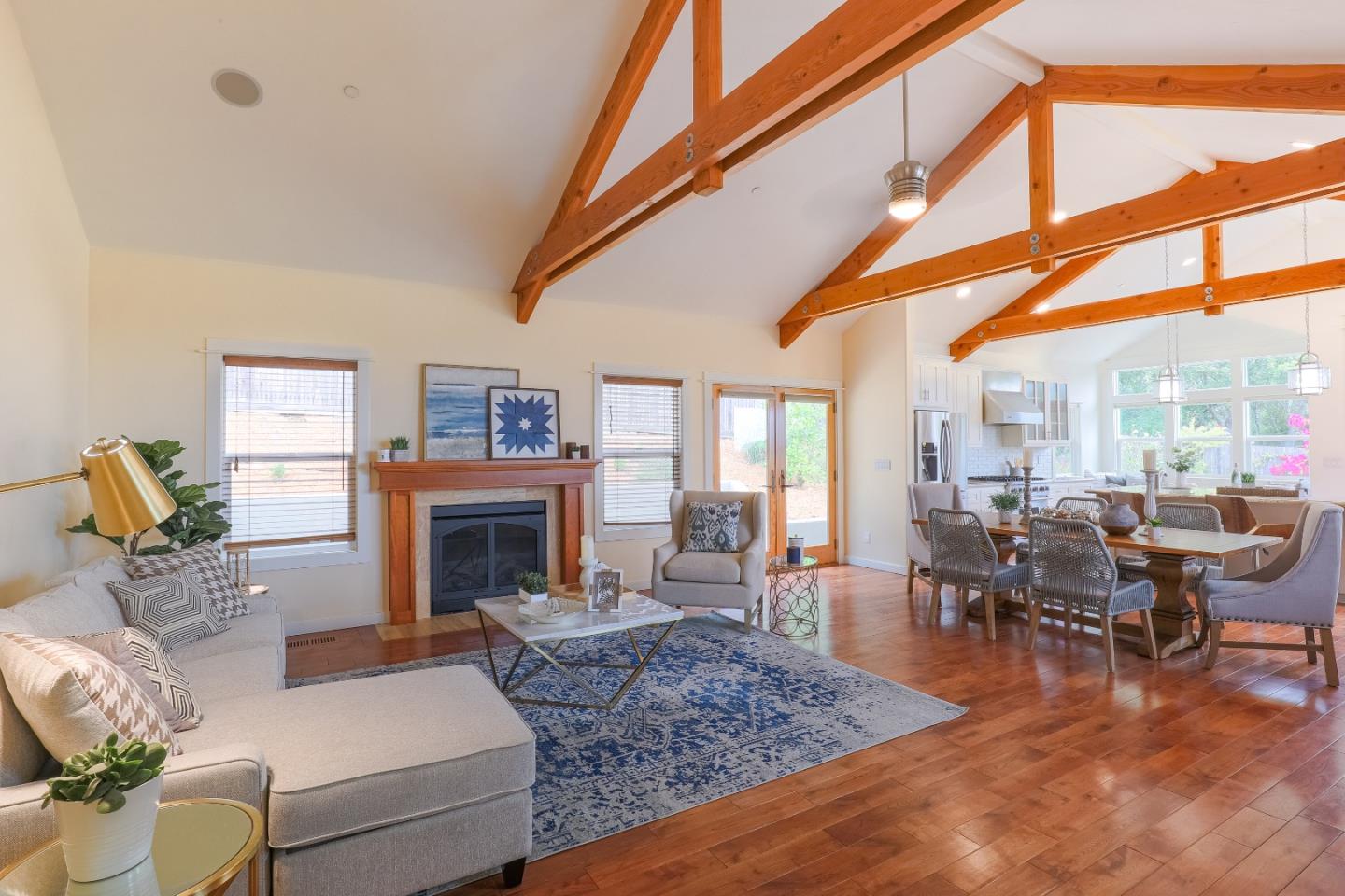 3030 Haas Drive Aptos, CA 95003 - Photo 9 of 44 a living room with furniture a fireplace and a floor to ceiling window