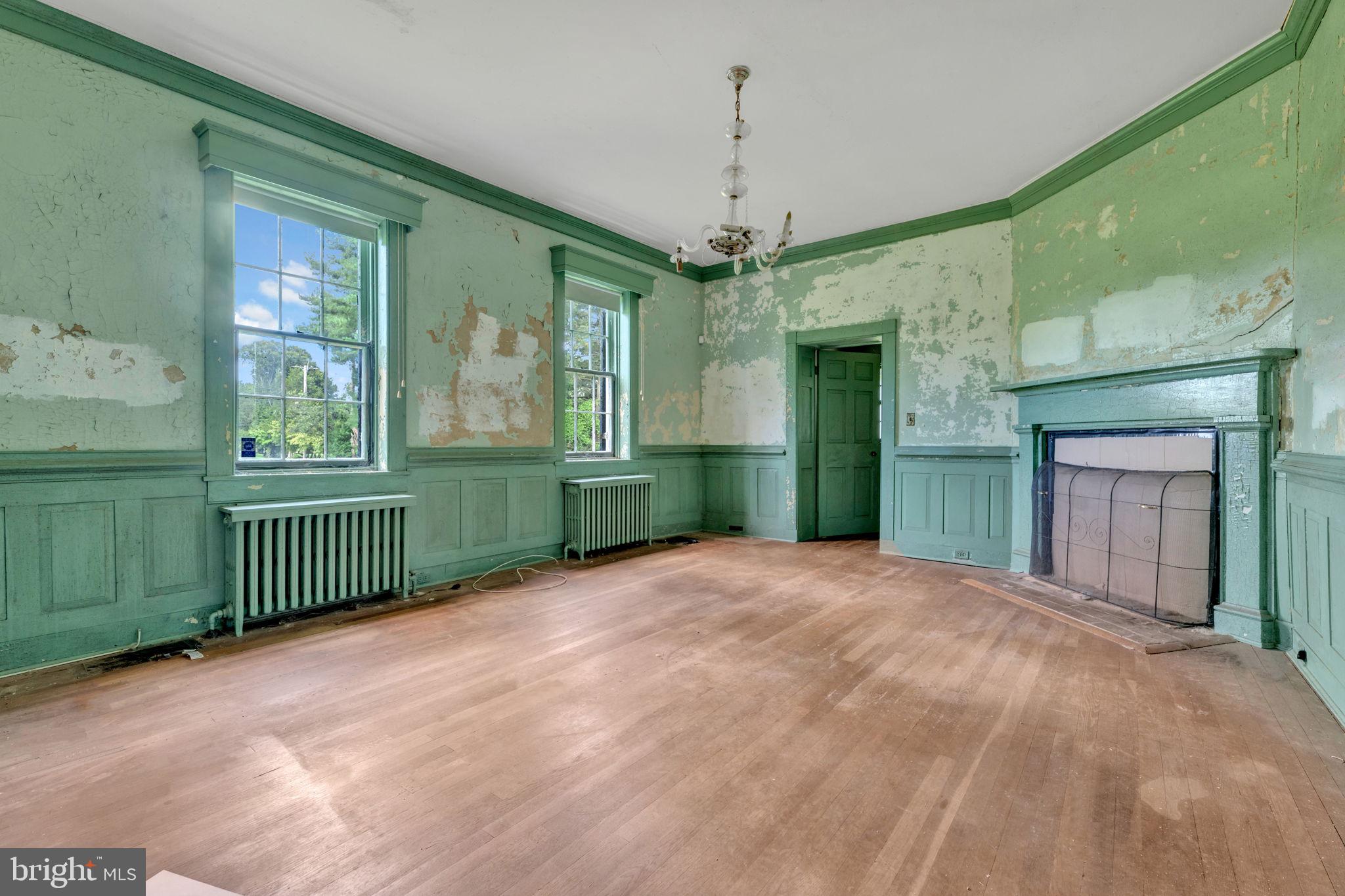 2173 Johns Hopkins Road Gambrills, MD 21054 - Photo 14 of 18 a view of a room with a large window and chandelier