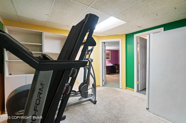 a room with a dresser and a mirror