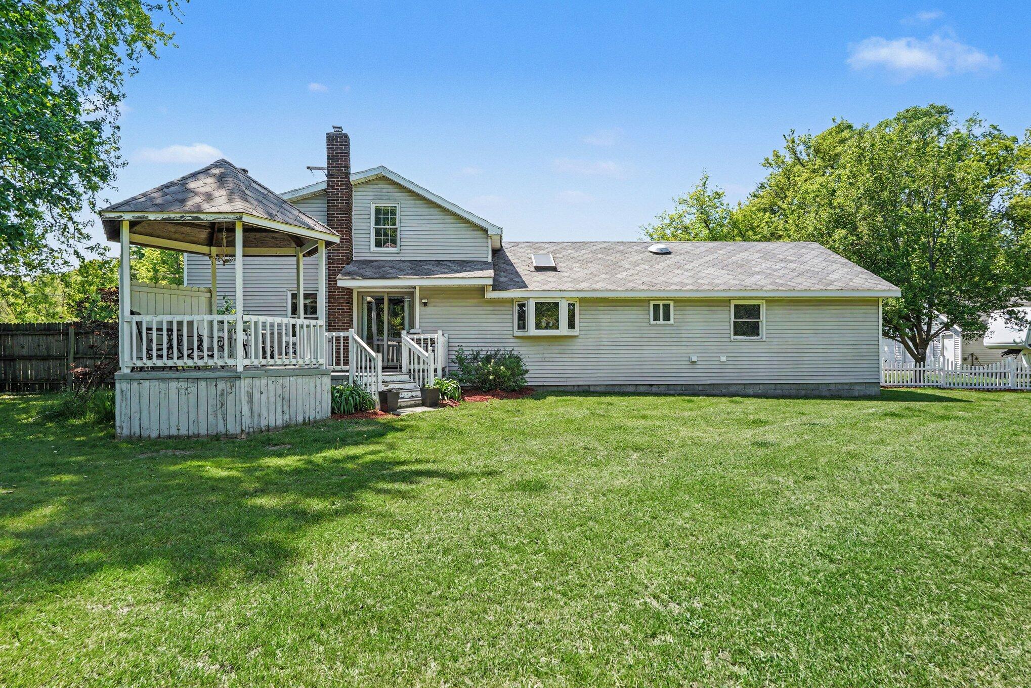 1721 Indian Lakes Road Northwest Kent City, MI 49330 - Photo 19 of 22 Back View