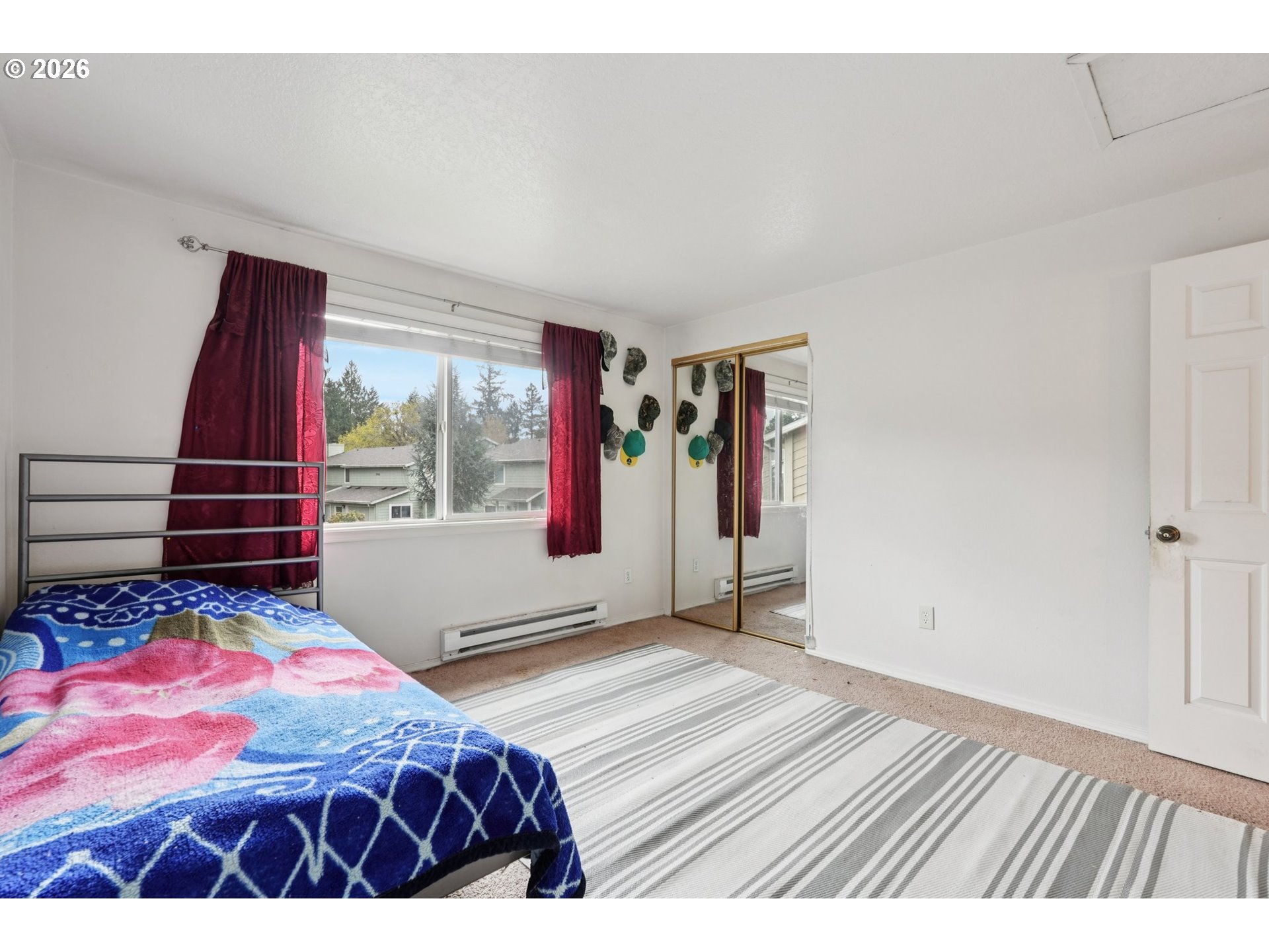 29480 Southwest Volley Street Wilsonville, OR 97070 - Photo 16 of 29 a bedroom with a bed and a window