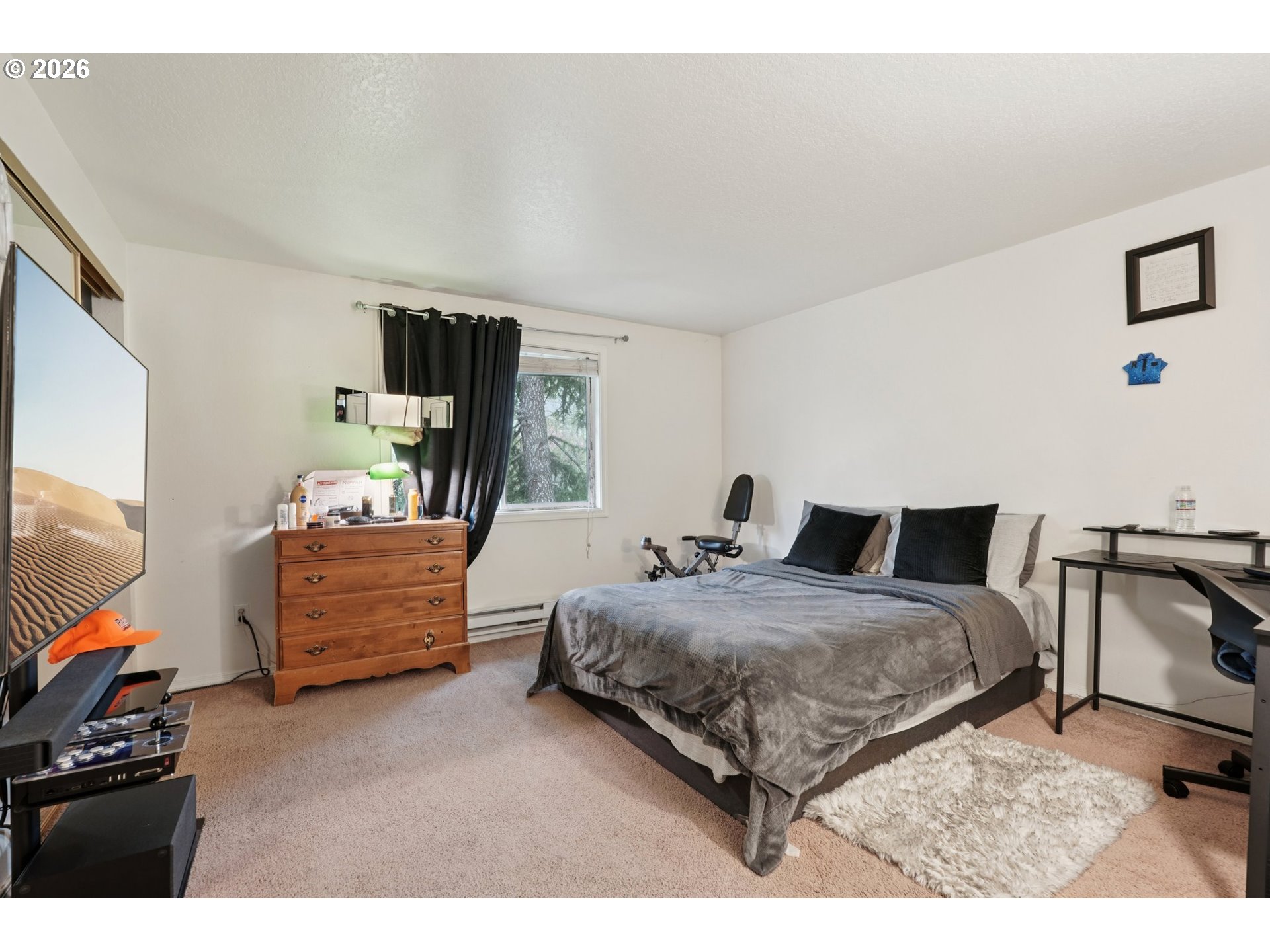 29480 Southwest Volley Street Wilsonville, OR 97070 - Photo 18 of 29 a bedroom with a bed and wooden floor