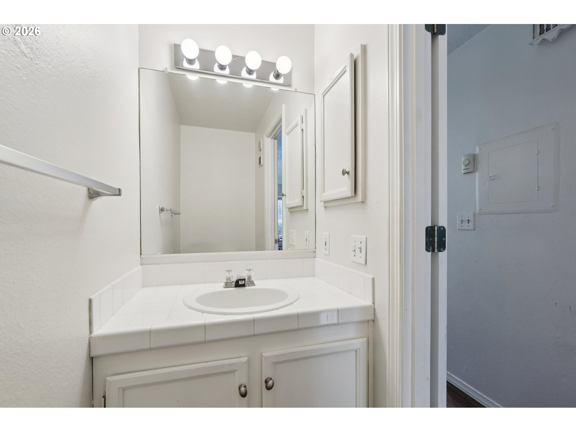 29480 Southwest Volley Street Wilsonville, OR 97070 - Photo 21 of 29 a bathroom with a sink vanity and a mirror