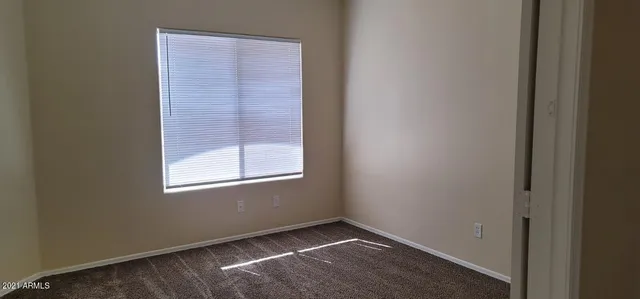 a view of a bathroom with mirror
