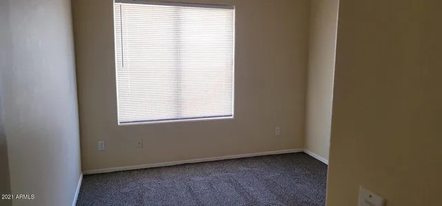 a view of an empty room with empty racks