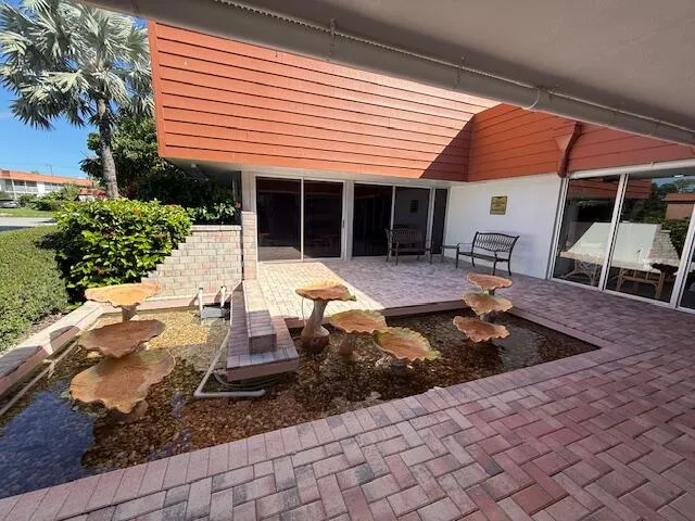 a front view of a house with patio