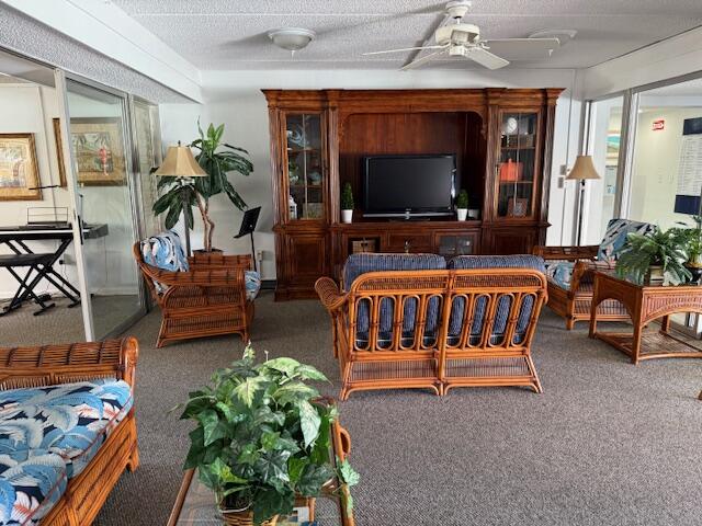 2600 Southeast Ocean Boulevard, Unit JJ2 Stuart, FL 34996 - Photo 19 of 29 a living room with furniture and a flat screen tv