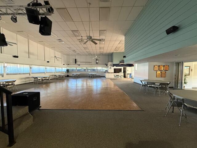 2600 Southeast Ocean Boulevard, Unit JJ2 Stuart, FL 34996 - Photo 24 of 29 a kitchen with a table chairs and a stove
