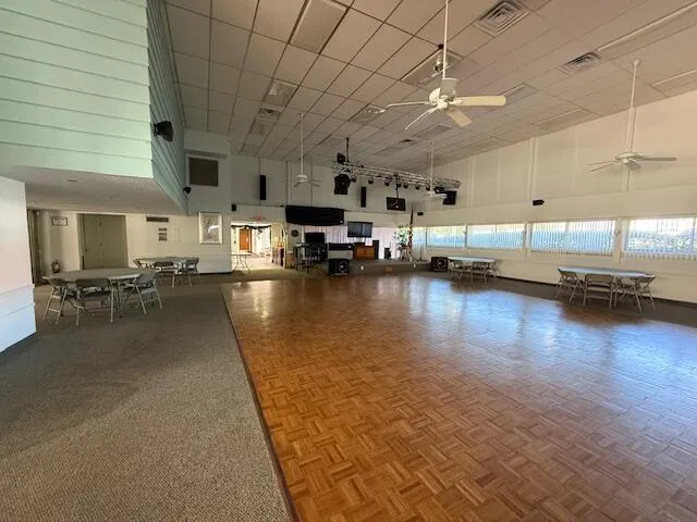 a view of a living room and kitchen