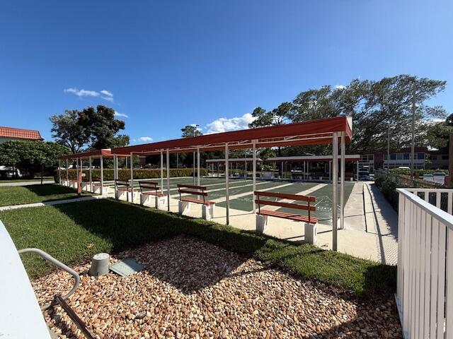 2600 Southeast Ocean Boulevard, Unit JJ2 Stuart, FL 34996 - Photo 28 of 29 a view of a house with backyard and sitting area