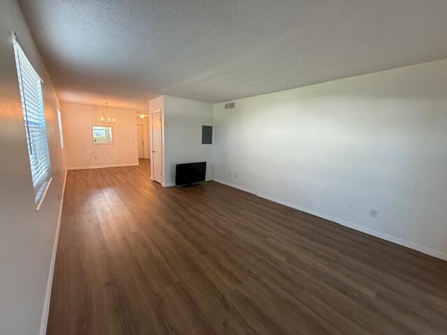 2600 Southeast Ocean Boulevard, Unit JJ2 Stuart, FL 34996 - Photo 6 of 29 wooden floor in an empty room with a window