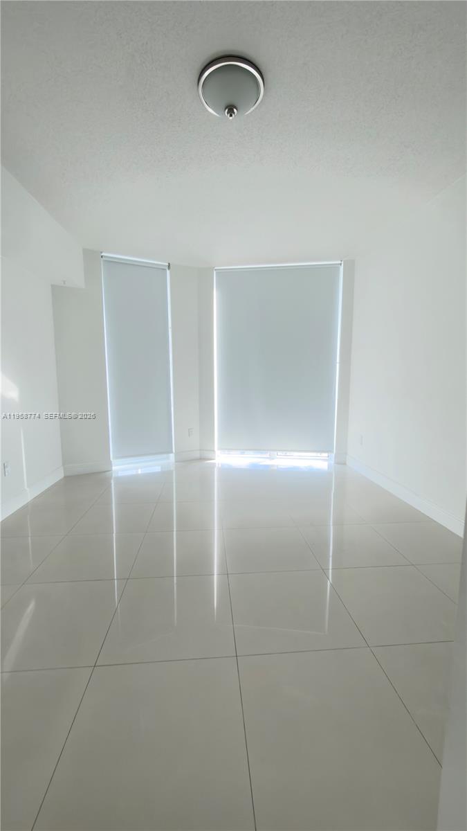 185 Southwest 7th Street, Unit 3810 Miami, FL 33130 - Photo 18 of 29 a view of an empty room