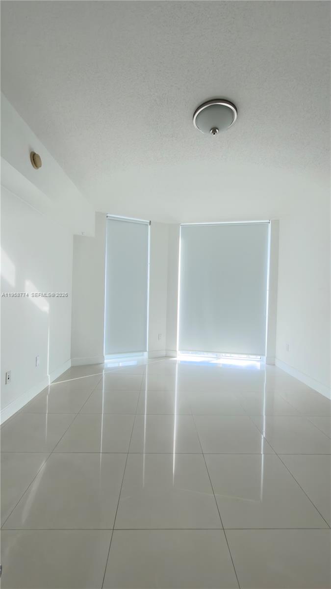 185 Southwest 7th Street, Unit 3810 Miami, FL 33130 - Photo 22 of 29 a view of an empty room