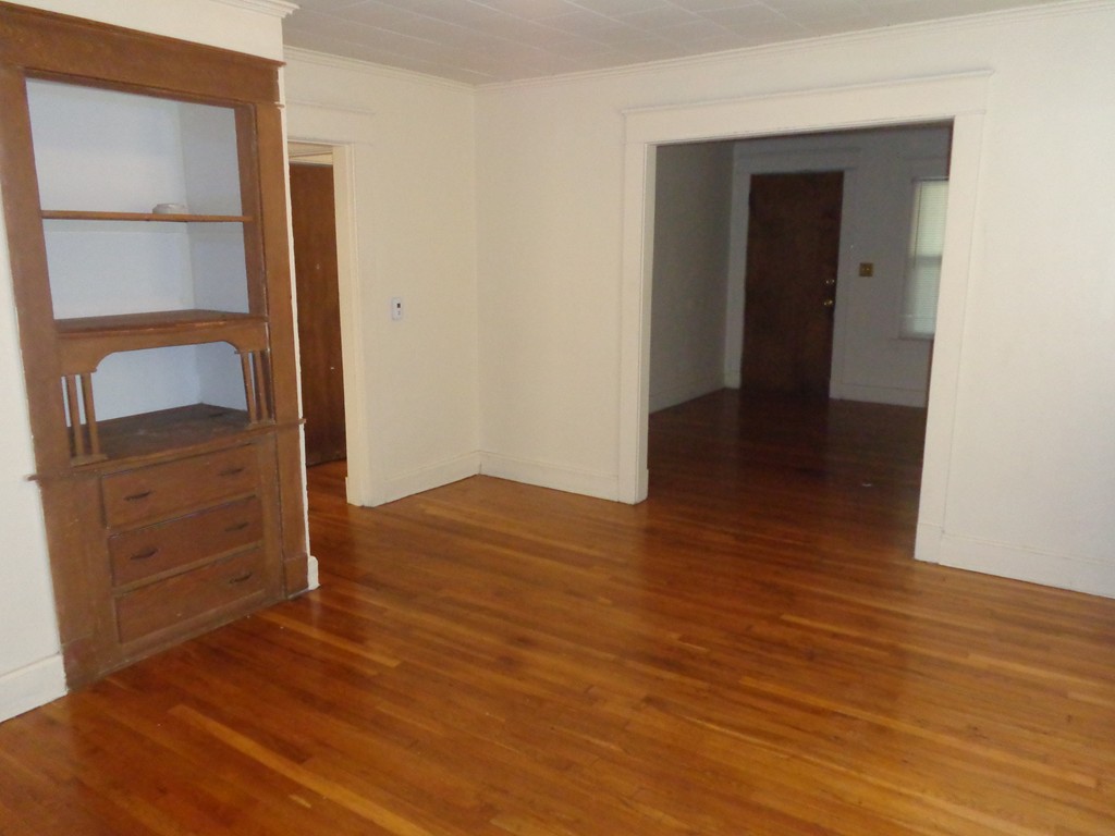39-41 Ralph Street Springfield, MA 01109 - Photo 3 of 13 wooden floor in an empty room