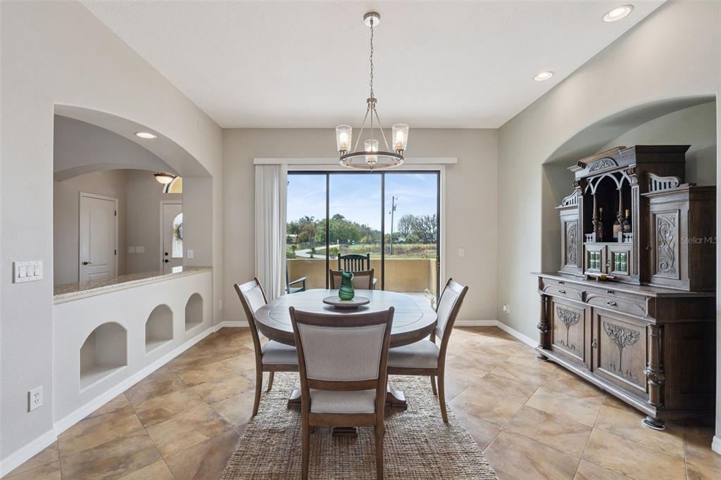 7139 Groveland Farms Road Groveland, FL 34736 - Photo 4 of 36 a view of a dining room with furniture window and outside view