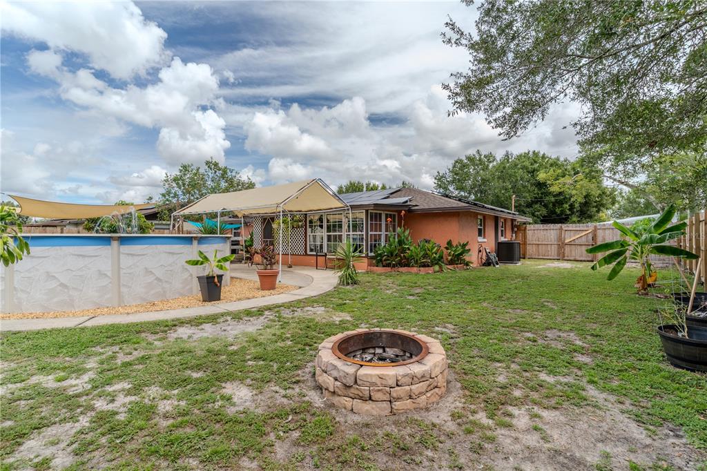 147 Hayes Street Lake Wales, FL 33859 - Photo 31 of 31 a view of a house with a yard and sitting area